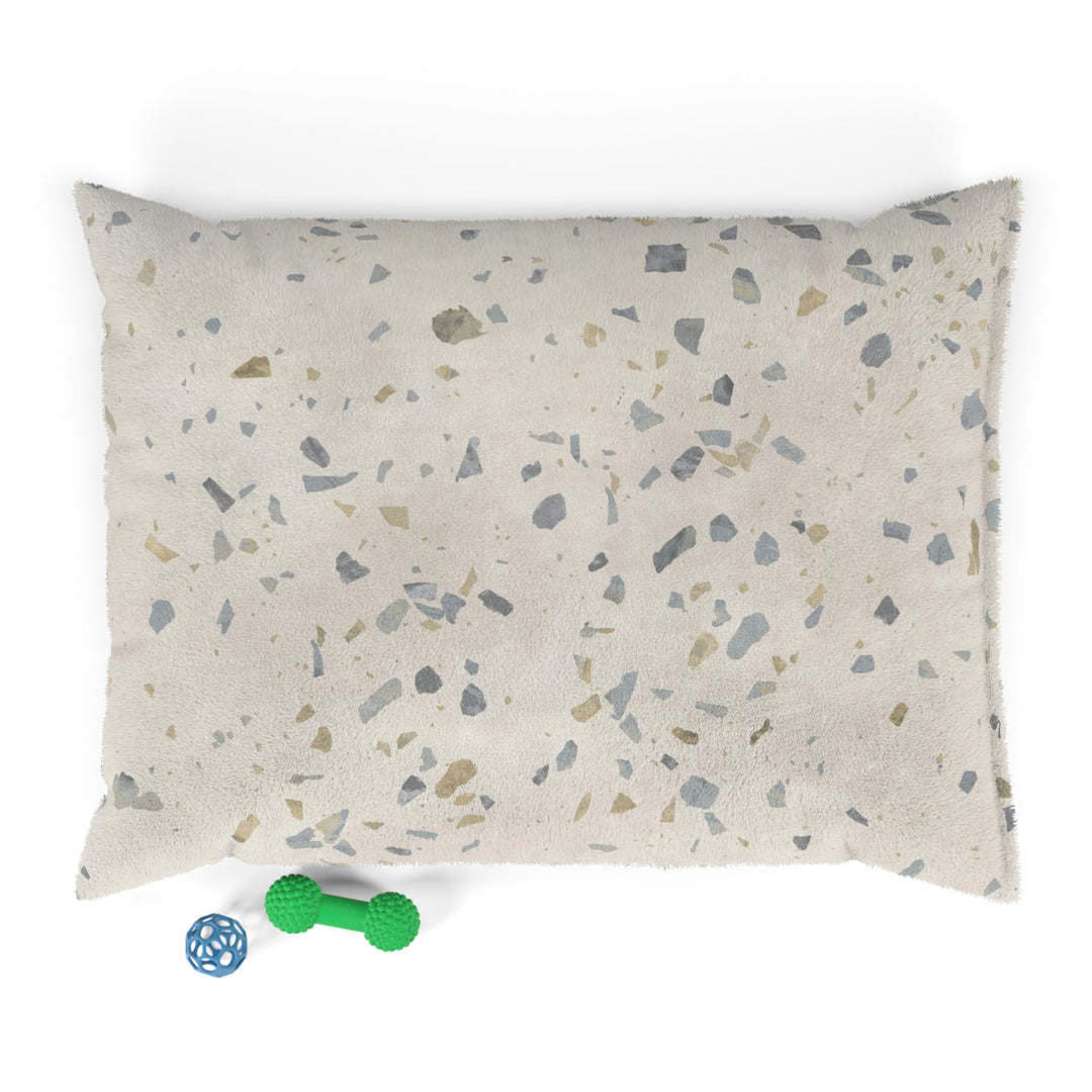 Medium dog bed in Ultima Earl Grey terrazzo design with dog toys