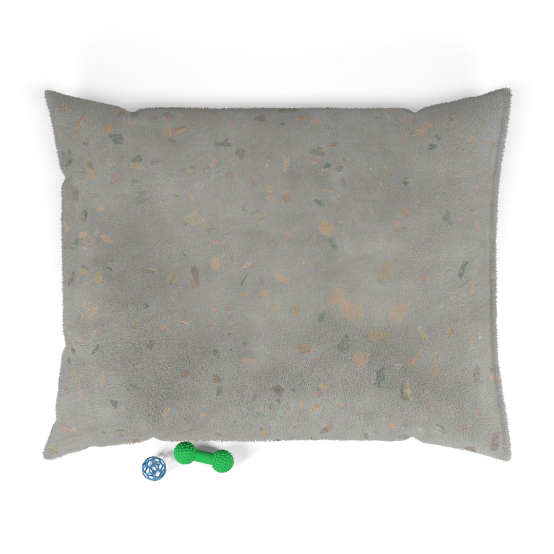 large dog bed in Ultima Comfit terrazzo design with dog toys