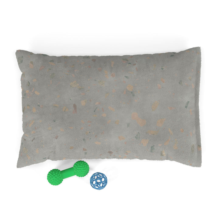 Small dog bed in Ultima Comfit terrazzo design with dog toys