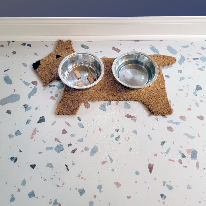 Earl Grey terrazzo vinyl tiles with dog mat, dog bowls , treats and water