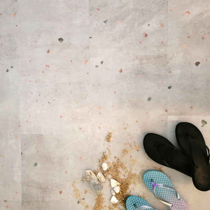 Terrazzo vinyl floors with beach sand, shells and sandals