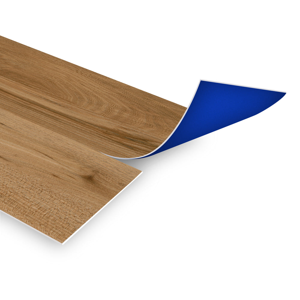 Allure Tea Ground Wood Peel & Stick vinyl flooring planks viewed at an angle to see the blue adhesive backing