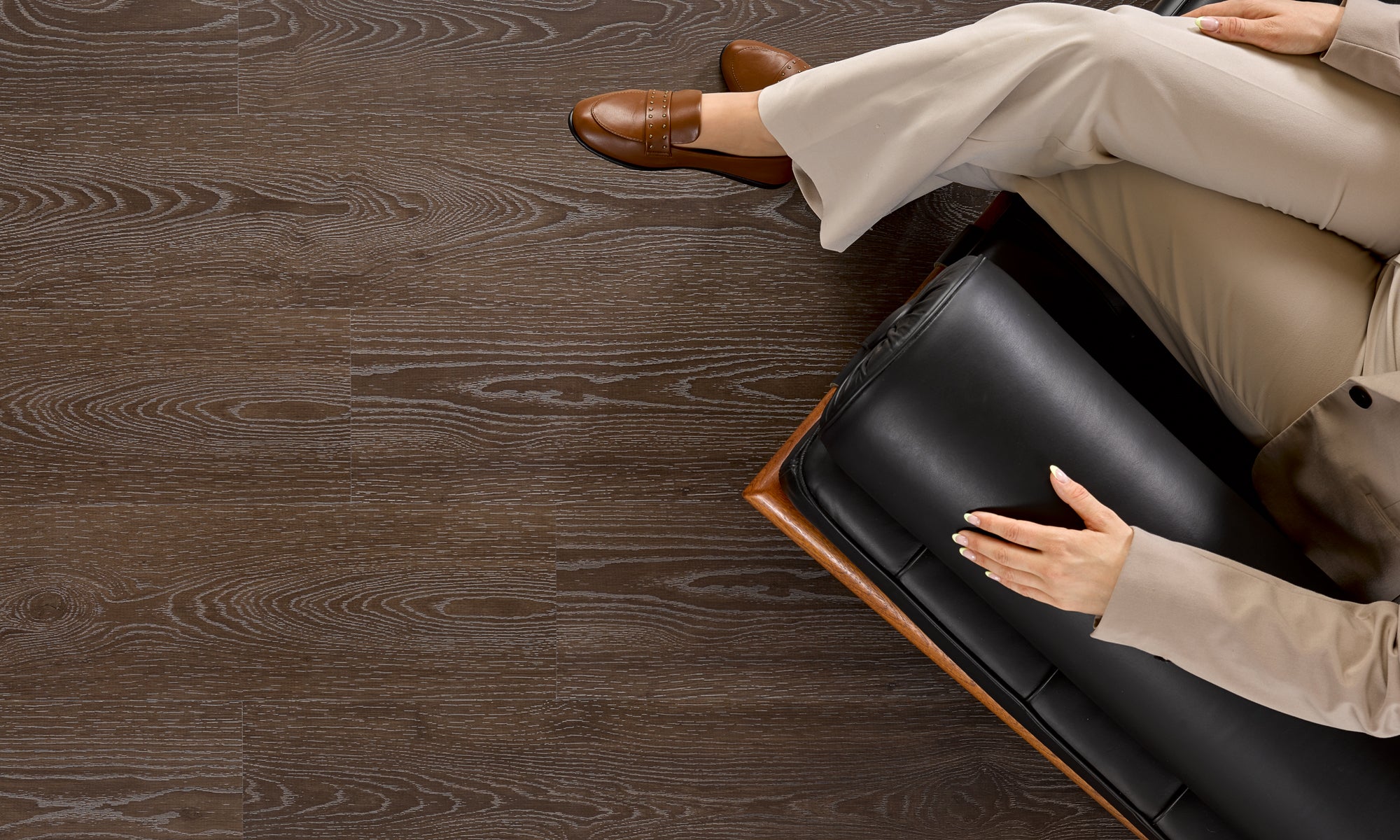 SRP TPU flooring with a mid-century modern chair and seated woman