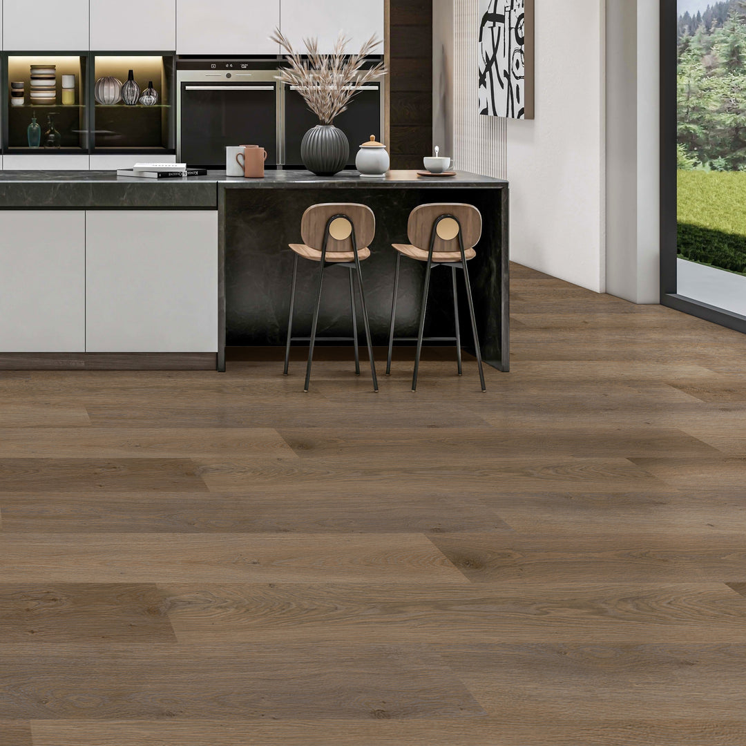 Allure Vanilla Latte Oak plank flooring in a kitchen with a kitchen island and high chairs tucked underneath