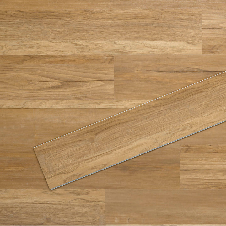 Allure SRP TPU Flooring in Mixed Timber Seawood installed floor view from above with single plank laying on top
