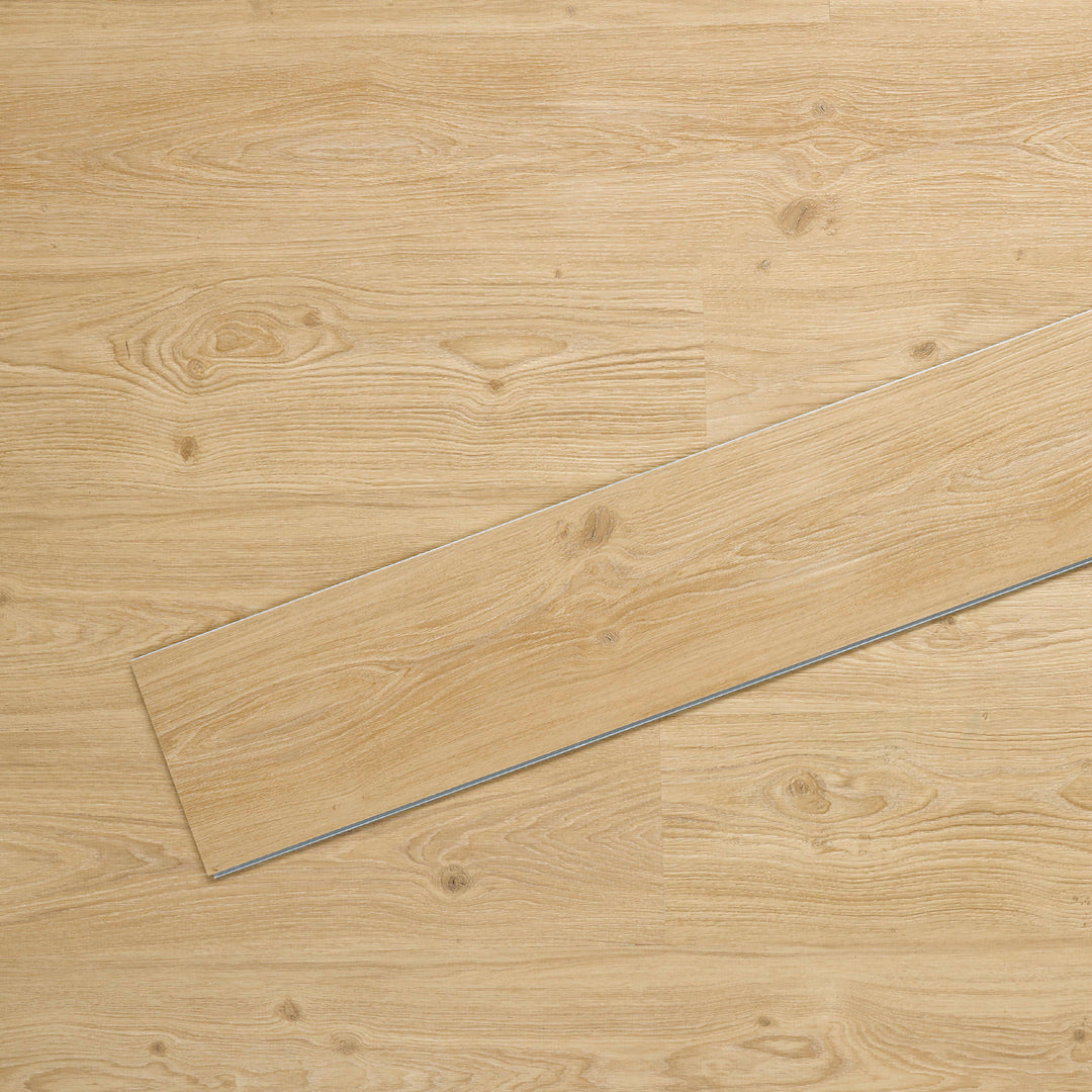 Allure SRP TPU Flooring in Natural Oak Nutmeg installed floor view from above with single plank laying on top