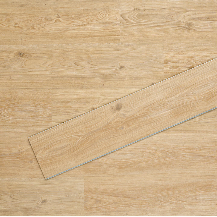 Allure SRP TPU Flooring in Natural Oak Cinnamon installed floor view from above with single plank laying on top