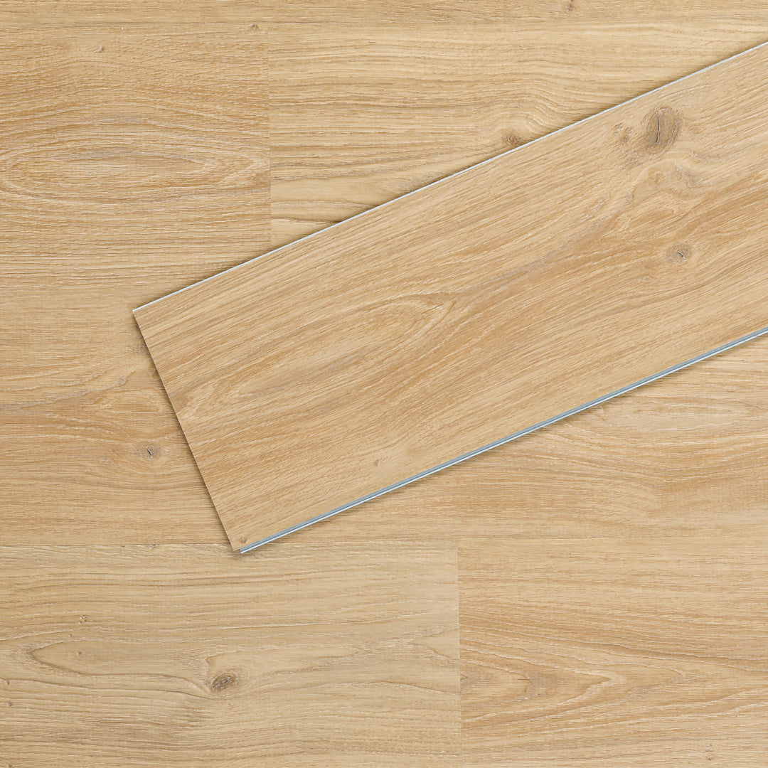 Allure SRP TPU Flooring in Natural Oak Cinnamon installed floor view from above with close up of single plank laying on top showing grooves and edges