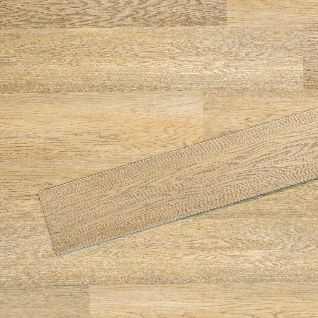 Allure SRP TPU Flooring in Pure Oak Sunrise installed floor view from above with single plank laying on top