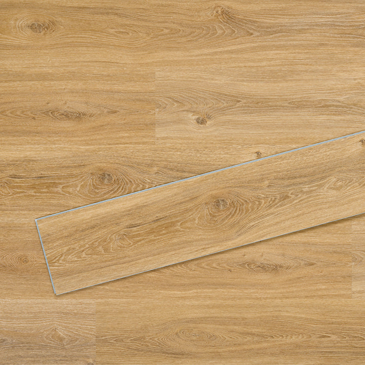 Allure SRP TPU Flooring in Contemporary Oak Cappuccino installed floor view from above with single plank laying on top