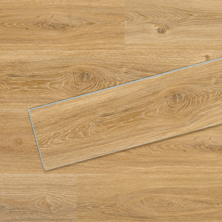 Allure SRP TPU Flooring in Contemporary Oak Cappuccino installed floor view from above with close up of single plank laying on top showing grooves and edges