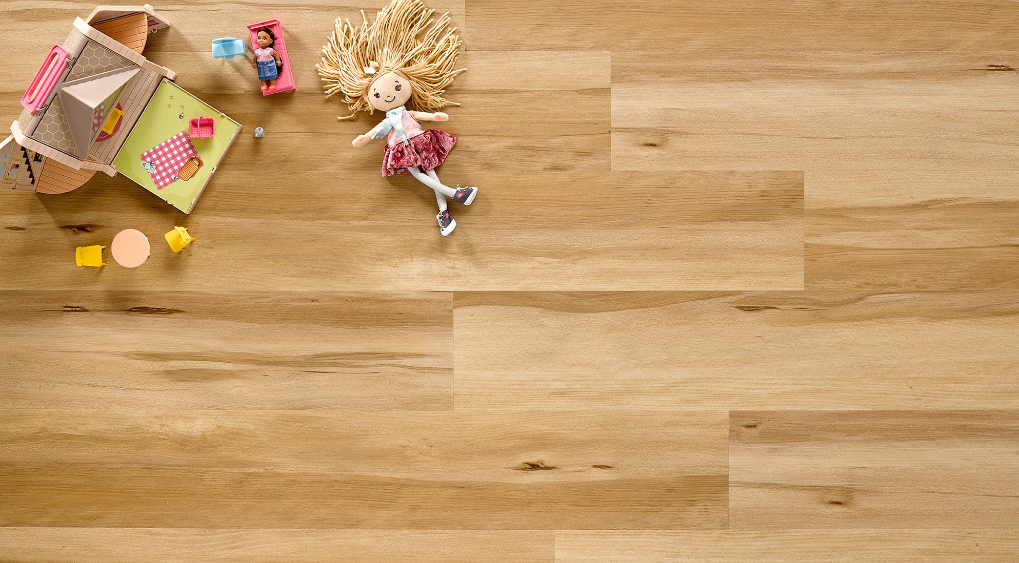 Allure TPU flooring with children's toys spread out